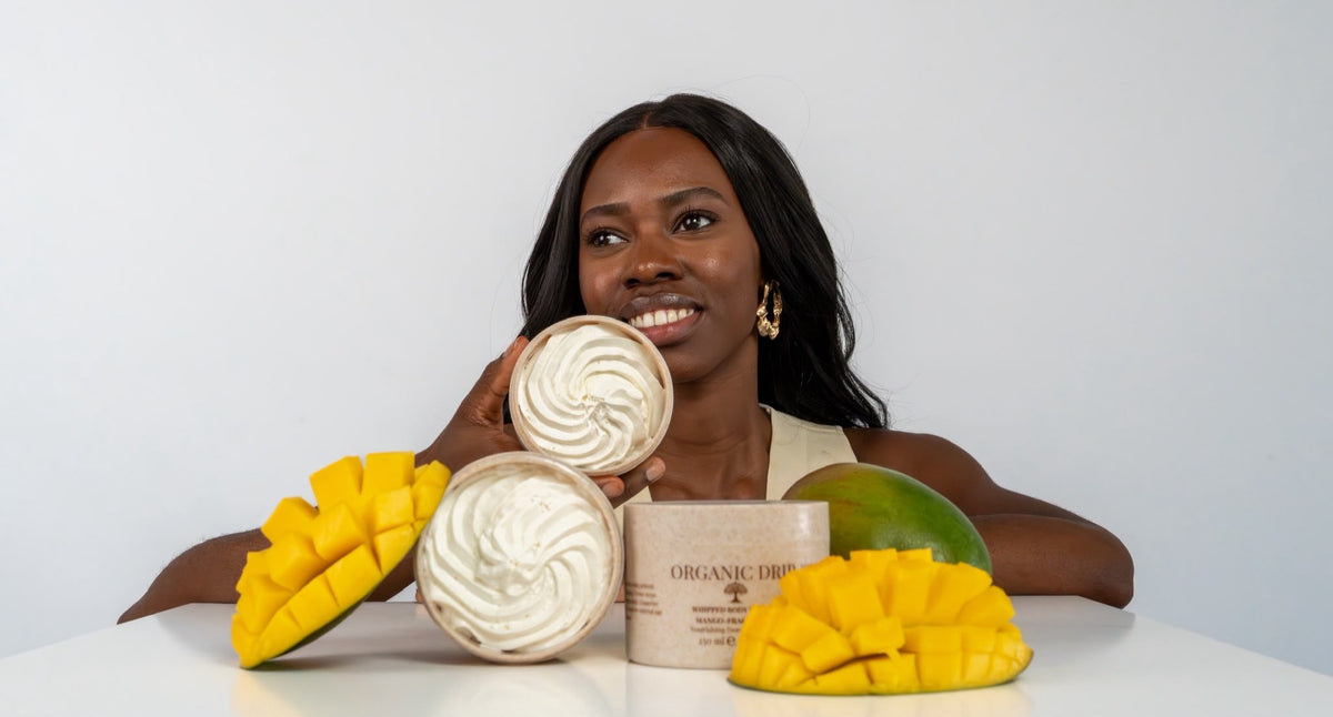 Organic Drip Whipped Body Butter Mango with model and fresh mango