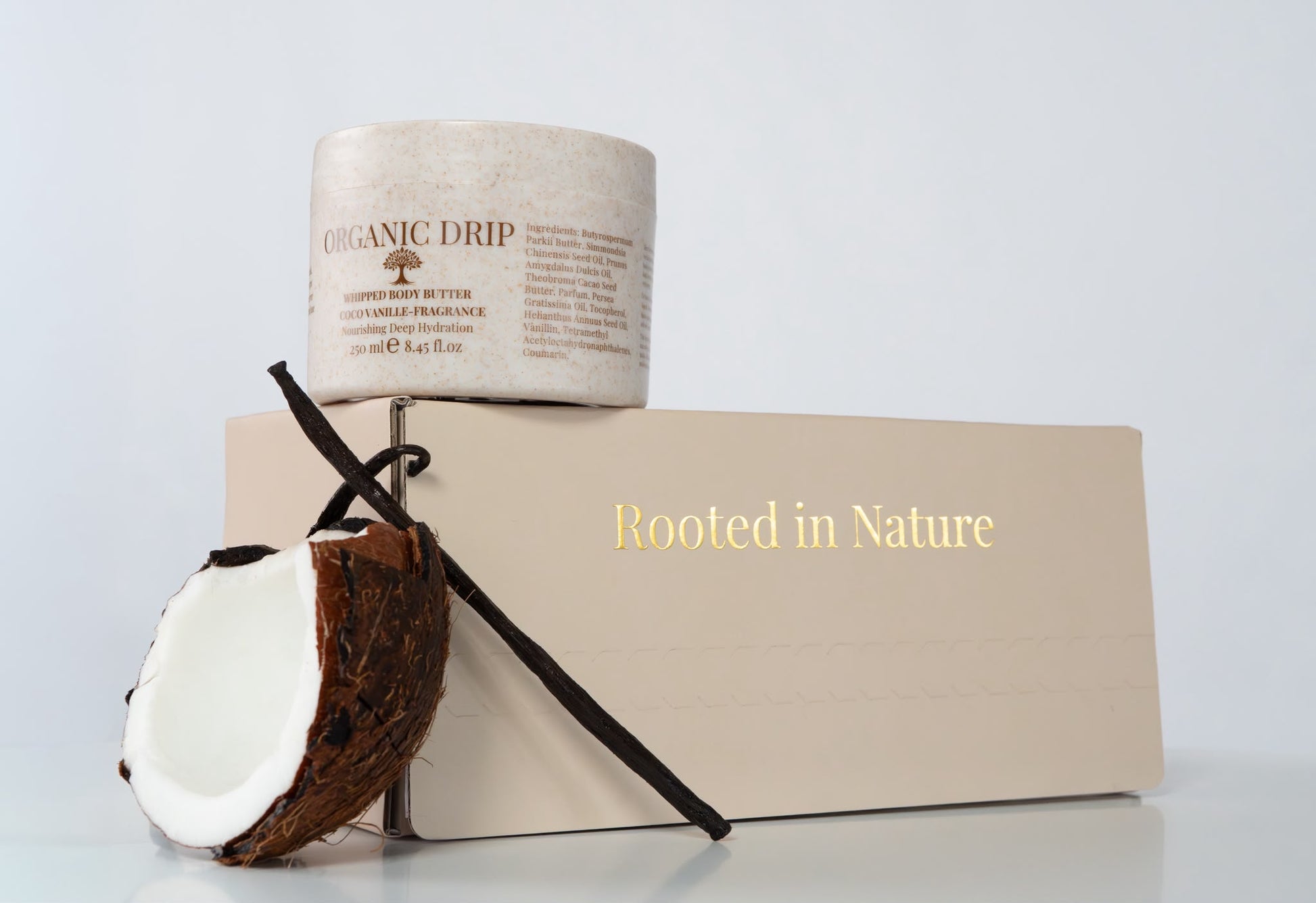 Organic Drip Vanilla & Coconut Whipped Body Butter 250 ml with fresh coconut and vanilla beans.
